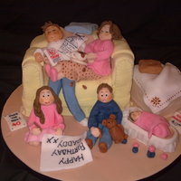 Family Cake This is my best friends' family all together, I did this cake for her husbands' 40th birthday celebration.