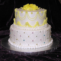 First Wedding Cake There are a lot of firsts in this cake - first stacked cake, first use of an impression mat, making drop strings, etc. I'm trying out...