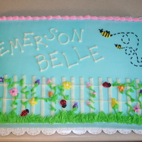 Spring Baby Bumble Bee This is a 1/2 white, 1/2 strawberry cake covered in BC I made for a May baby dedication.