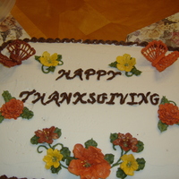 Thanksgiving Cake For Family This is a 2 layer 1/2 sheet BC vanilla cake with chocolate creamcheese filling, chocolate BC borders on cake. Royal Icing flowers.