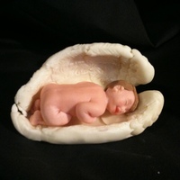 Baby Wrapped In Wings Made out of modeling chocolate