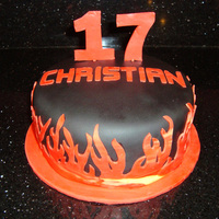 Christian's Birthday Cake This cake was made for a 17 year old boy. I was told to use the number 17 and red & black. It is WASC with chocolate chips. TFL!