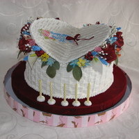 Basket Of Roses royal iced basket filled with sugar flowers.