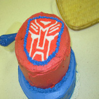 Transformer/autobot Cake This is the cake for my son's 4th birthday. It is the first FBCT that I made. The cake is chocolate with a chocolate buttercream...