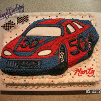 Nascar Birthday Cake Wilton Nascar pan on top of a half-sheet cake.