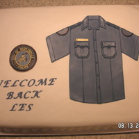 Welcome Back Les Buttercream covered cake smoothed to look like fondant. Fondant cut-out shirt