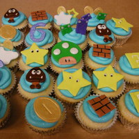 Super Mario Galaxy Cupcakes These cupcakes are joined with the super Mario Galaxy cake
