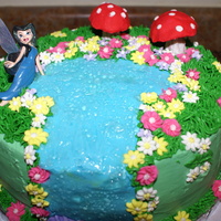 Fairy Land this is a cake a made for my midterm project. Buttercream icing and flowers made out of royal icing.