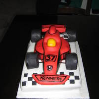 Formula Car All fondant cake, Carrot cake base with chocolate filling and plain sponge for the car, was fun to make but very time consuming!