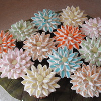 Flower Cupcakes I found this idea in a cupcake book. They were very easy and very colorful. The flowers are made out of mini marshmallows cut in half and...