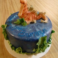 Sea Dragon Sea Dragon 21st Birthday cake, chocolate cake with cherry filling. Sea dragon is white chocolate with fondant accents.