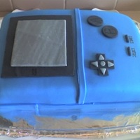 Gameboy Cake This cake is made for my brother's 20th birthday. Everyone at the party loved it including him =)