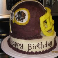 Redskins Helmet Birthday Cake This cake was fun to make. I had quite a time trying to get that indian to look like an indian. I also had a hard time reaching the color...