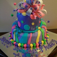 Purple Mad Hatter Covered and decorated with MMF, bow out of gumpaste