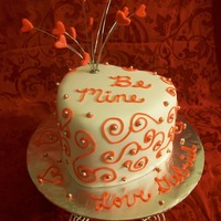 Valentine's Day Heart Red velvet cake and cream cheese frosting. I used a cc user's idea for the heart star-burst- Thanks!