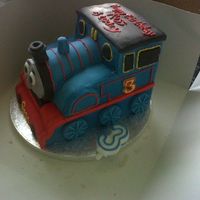 Thomas The Tank This is my first 3d cake it turned out not bad, a few misakes which I will bear in mind for the next time. Photo isn't very clear