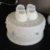 Christening Cake,white,baby Shoes, Boy,girl This is a practice cake for a Christening made from fondant with sugarpaste shoes and royal icing scrolls and dots. I have to say I need...