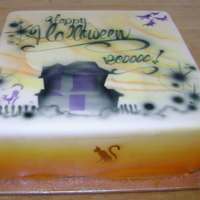 Airbrushed Fondant,halloween Theme This is a detailed Airbrush Fondant cake with a multi-coloured fade on sides and, cat and witch motifs on sides, a Haunted house and fancy...