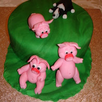 Pig Chase My first attempt at moulding animals for a friends Birthday cake and animals are both fondant