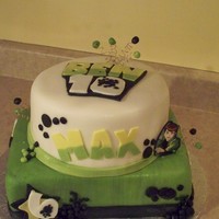 Ben 10 Birthday Boy favorite Cartoon.White Pound cake with Buttercream frosting .. covered with fondant. All details done in Fondant.