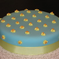 Quick Cake Fondant with royal icing decorations and ribbon detail