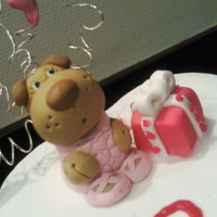 Lucie As A Ballerina My little mascot, Lucie a sharpei, dressed as a ballerina on top of a pink and white cake.