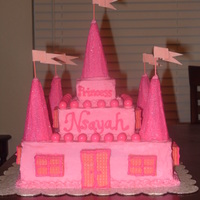 Pink Castle This is my first time making a Castle Cake. It's for my God-daughter's birthday party. I like it because everything is edible......