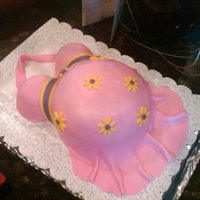 Belly Cake First belly cake.....and first time using fondant on the ENTIRE cake. White cake, strawberry filling, buttercream icing, marshmallow...