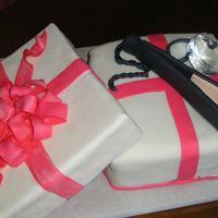 Surprise Its Not A Straightener My d-i-l thought she was getting a hair straightener for her birthday. She got a diamond engagement ring.