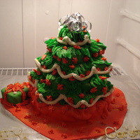 Christmas Tree Cakes This cake is 25 mini cakes, strawberry and vanilla pound cakes individually icing with buttercream icing and fondant stacked into a...