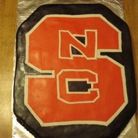 Nc State Grooms Cake Red velvet, cream cheese icing, marshmallow fondant. North Carolina State University symbol!