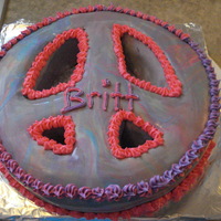 Peace Sign Cake This is strawberry cake, buttercream icing and marshmallow fondant! Tie-dyed in color for a birthday!