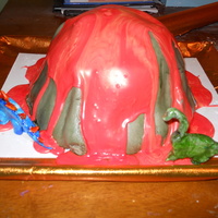 Volcano Cake Making this reminded me of my fourth grade science experiment! I made it for my nephew's 2nd birthday. Yellow cake with chocolate...