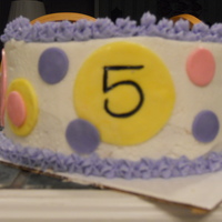 Viv's 5Th B-Day "Fun-fetti" style yellow cake with buttercream frosting and fondant accents. Was also topped with a gumpaste pony but somebody...