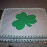 St. Patty's Day Half sheet cake with buttercream frosting. Plain and simple shamrock.