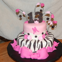 Zebra And Pink 13Th Birthday Cake Inspired by a picture here on CC! Buttercream covered in fondant with fondant zebra strips. So fun to make.
