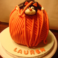 Kitty On Yarn My daughter wanted a cake with a kitten. It's a vanilla cake covered in buttercream and fondant. The cat is fondant. This was a lot of...
