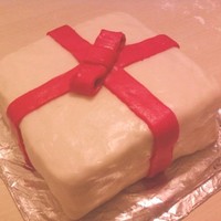 Practice Present Cake So, here's a present cake. It's white with a dulce de leche filling and rolled buttercream. Let me tell you, I'm never going...