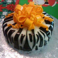 Zebra Birthday Cake Made this cake for my mom's birthday... 2nd fondant cake and 1st time making a birthday bow :) She loved it!
