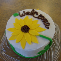 Sunflower Welcome Cake The woman ordering had friends coming to visit her for the first time and wanted a cheery, welcome cake. Marble cake, chocolate filling,...