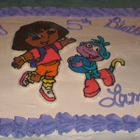 Dora The Explorer Dora The Explorer. Yellow cake, Buttercream Icing with a Frozen Butter Cream Transfer