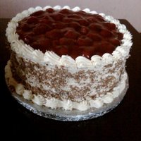 Strawberry Gateaux whipped cream icing with fresh strawberries and milk chocolate curls