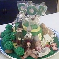 Wizard Of Oz Made for three year old. The Mom had 3" Madame Alexander figures. The house, tree, hot air balloon, and legs are rice krispie treats...
