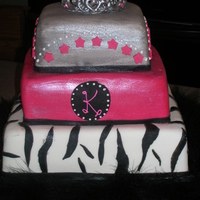 Sweet 16 Here's my 2nd cake. I was so excited to try a RI tiara. My first broke, but this one worked out. I LOVED making this cake. The middle...