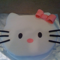 Hello Kitty Hello Kitty shaped fondant covered cake. Vanilla with cookies and cream filling. Glittery, but you can't tell in this picture. Thank...