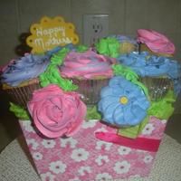 Mothers Day Cupcake Bouquet Small & large cupcakes in a springy Mothers Day bouquet