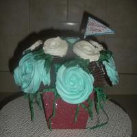 Cupcake Bouquet Regular & mini cupcakes decorated in buttercream