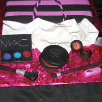 M.a.c Cake Chocolate cake with Cream Cheese and Raspberry drizzle filling. Covered in fondant. Gumpaste/Fondant make-up. The black compact cracked a...