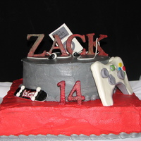 "all His Favorite Things" Buttercream cake with fondant accessories.