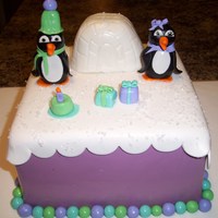 Penguin Cake penguin birthday, with fondant/gumpaste figures and rice krispie treat igloo